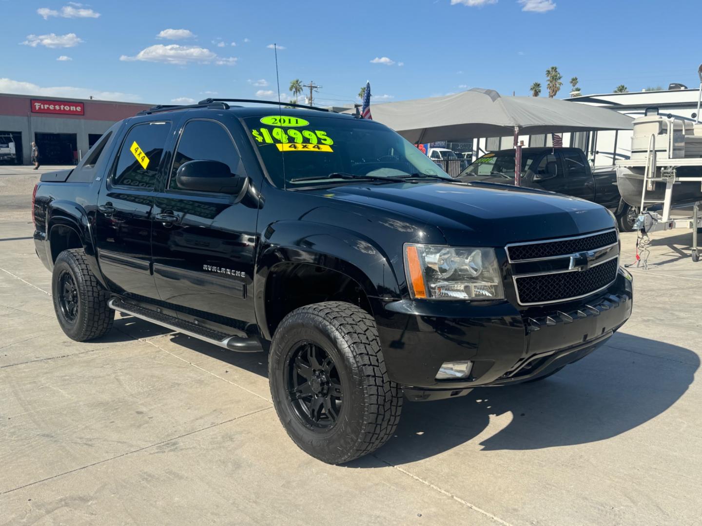 2011 Black /Black Chevrolet Avalanche (3GNTKFE31BG) , located at 2190 Hwy 95, Bullhead City, AZ, 86442, (928) 704-0060, 0.000000, 0.000000 - 2011 Chevrolet avalanche z71 . New motor with receipts . Lots of new parts . Lift kit , custom tires and wheels . 1 owner . Super clean , great running truck - Photo#0